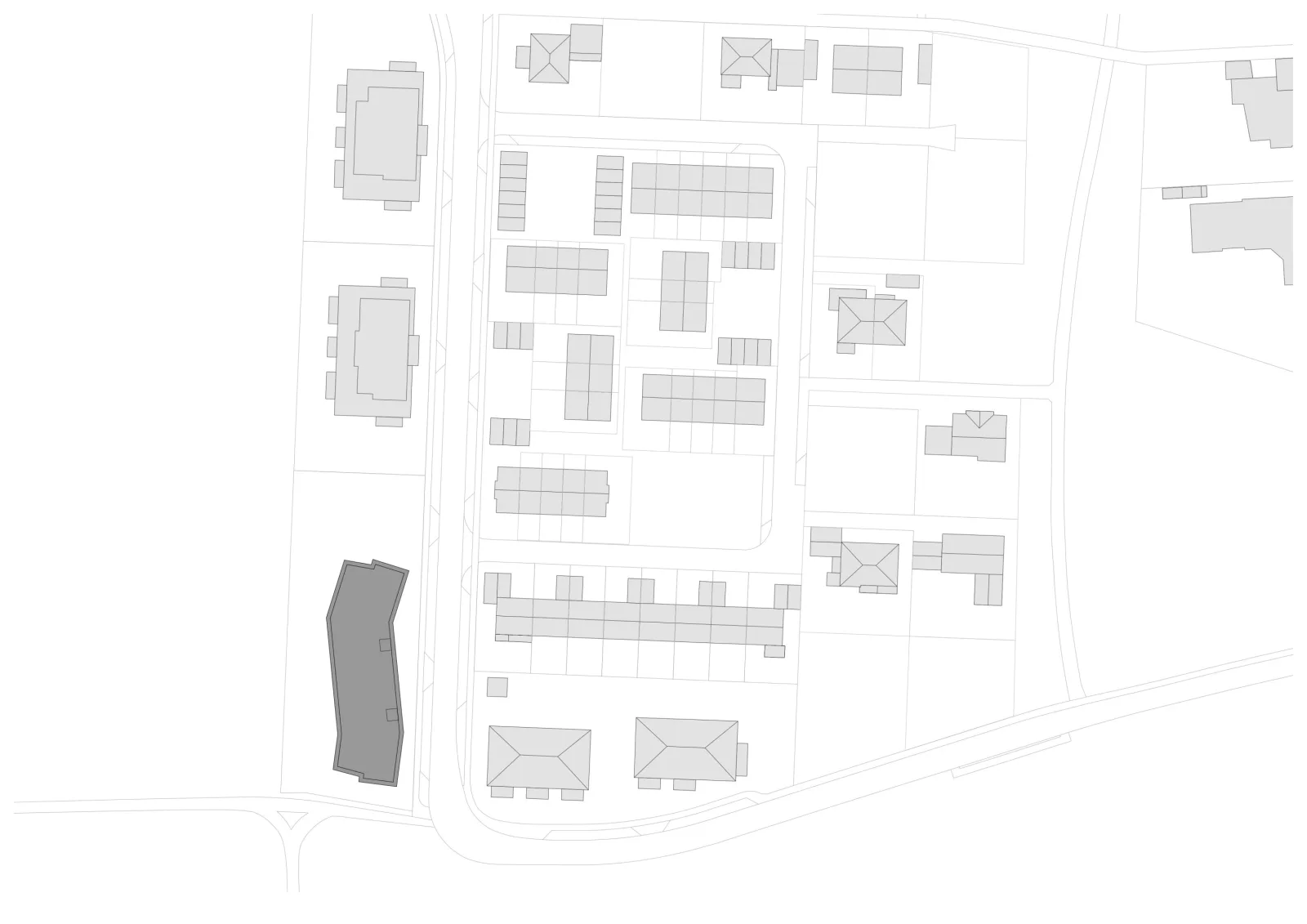 Lageplan des Hauses fast ohne Heizung: Der längliche, leicht geknickte Baukörper liegt am Rand des Wohnquartiers.